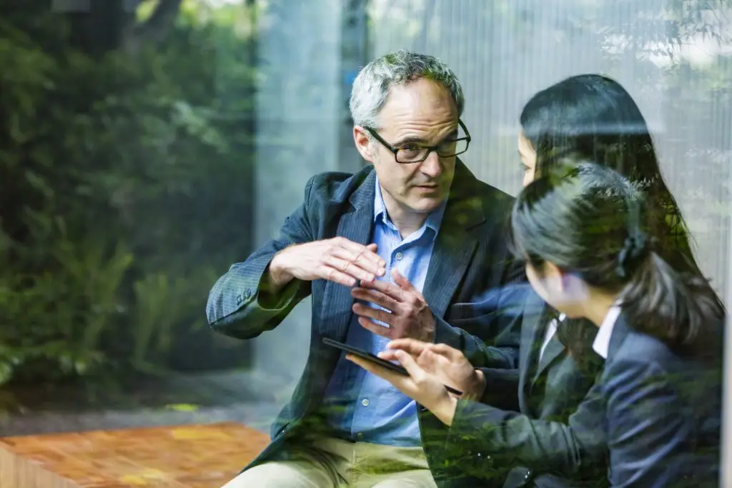 English Businessman Working Advising Japanese Corporate Professional Business Women