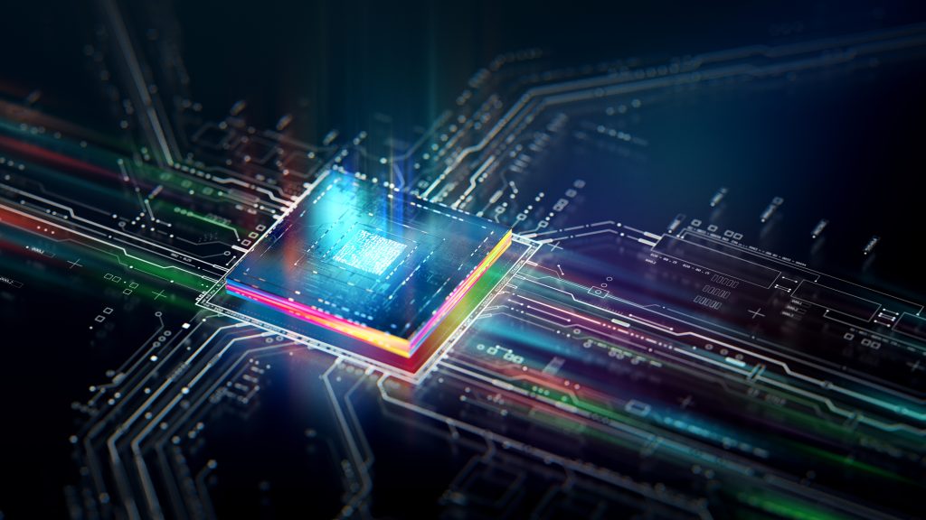 A computer chip with colorful circuit board stock photo.