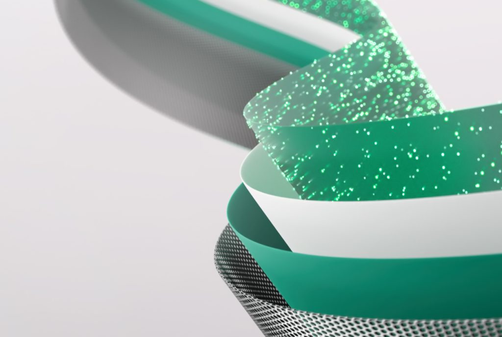 Abstract image featuring layered ribbons in green, white, and textured gray, with a segment of green glitter. Ribbons form a twisted, spiral pattern against a light gray background.