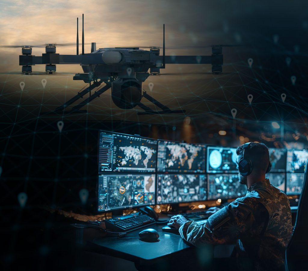A person in military uniform monitors multiple screens displaying maps and data; a drone flies above, with digital network graphics overlaying the scene.