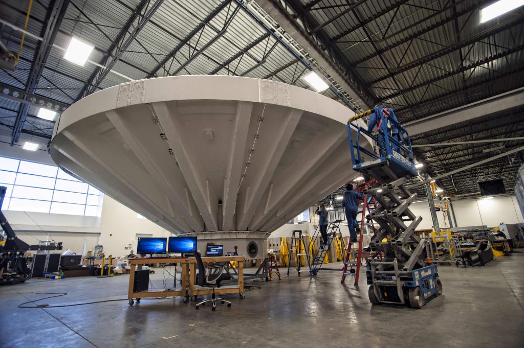 A sizeable composite antenna inside a warehouse.