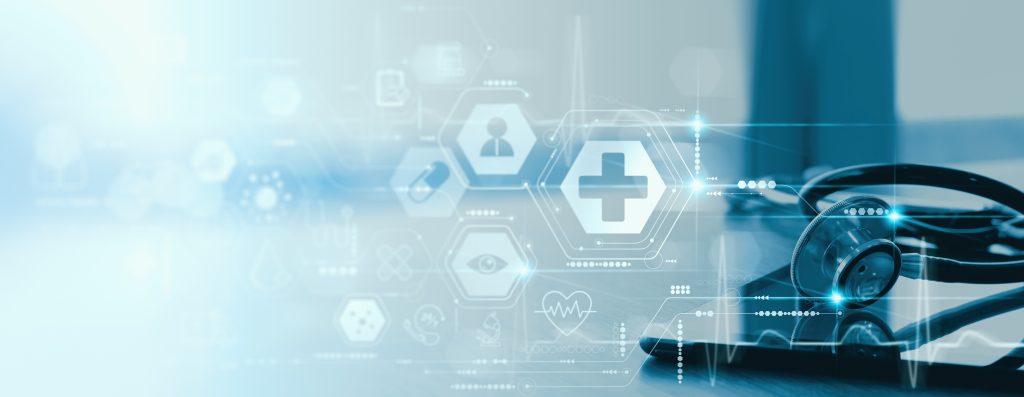 A stethoscope next to a tablet with digital medical icons and symbols overlaid, representing technology in healthcare.