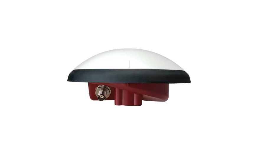 A white and black dome-shaped device with a red base and an adjustable knob on the side, isolated on a white background.