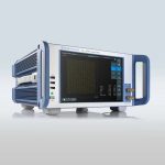 A signal analyzer with a blue and white casing, featuring a handle on the side, USB ports, a display screen, and buttons for control.