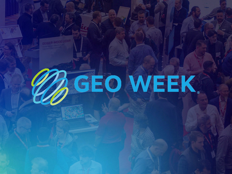 A crowd attends an indoor conference or expo; the words "GEO WEEK" and a blue and yellow logo are overlaid on the image.