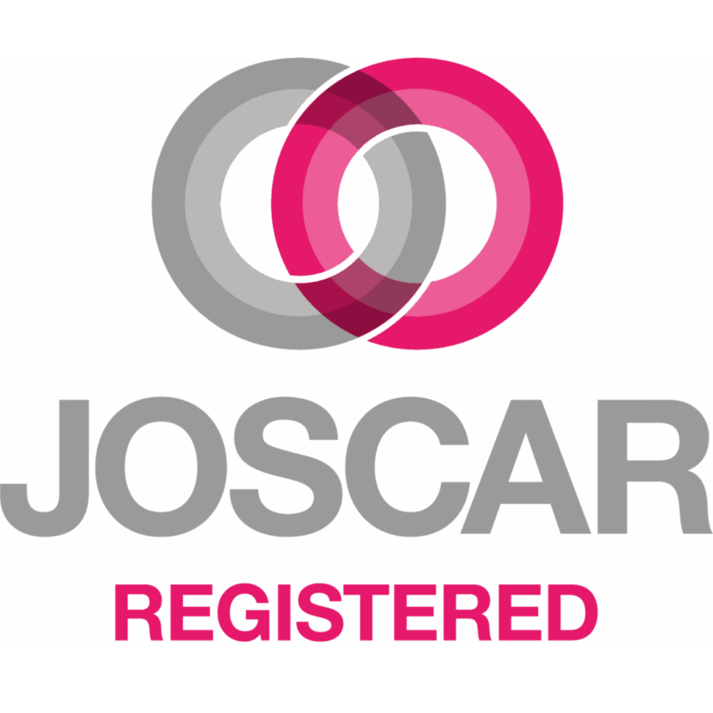 JOSCAR Registered logo with two overlapping circles, one gray and one pink, above gray and pink text reading “JOSCAR REGISTERED.”.